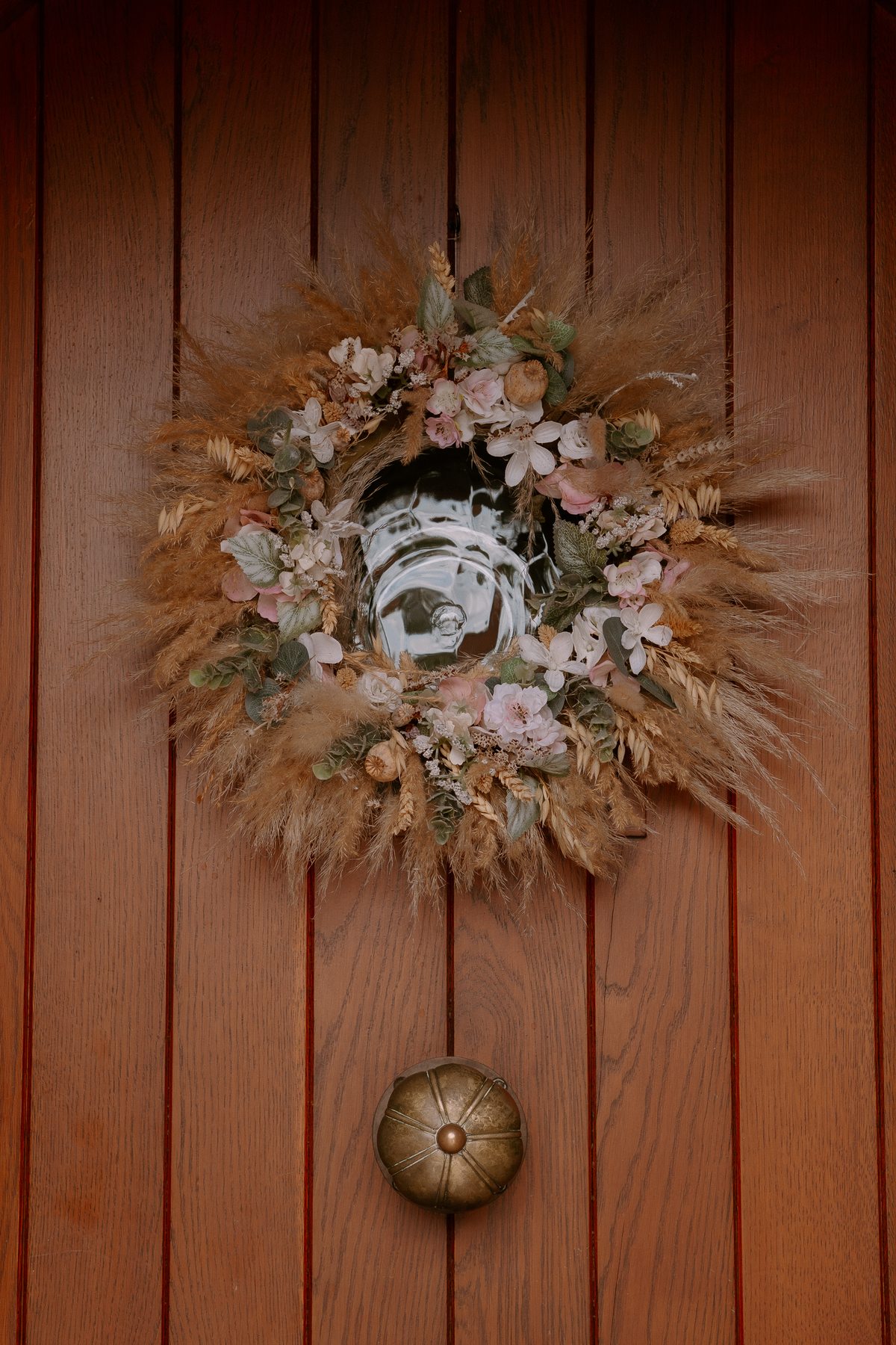 Myrtleberry front door with seasonal wreath