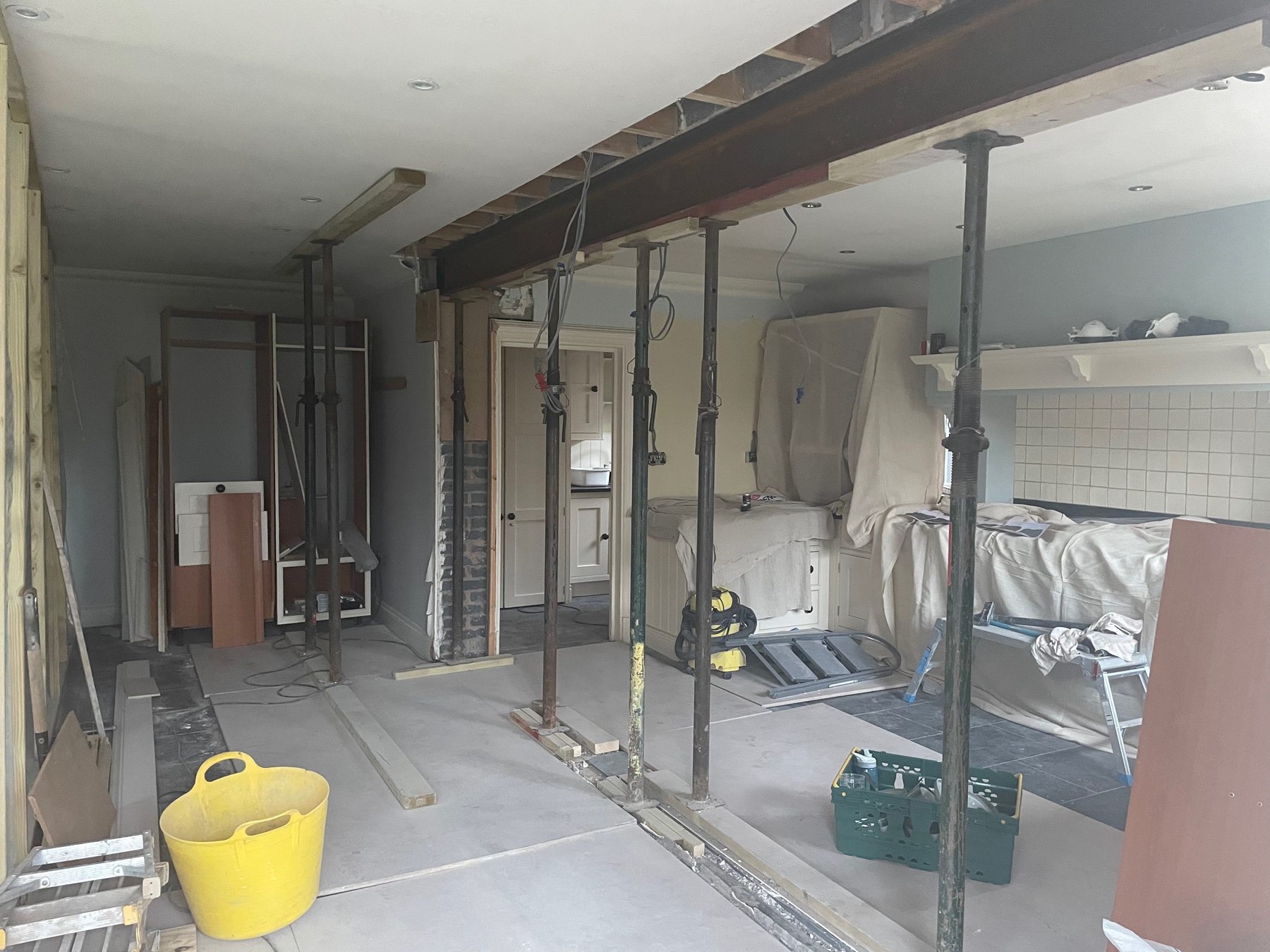 The newly opened kitchen space during building work